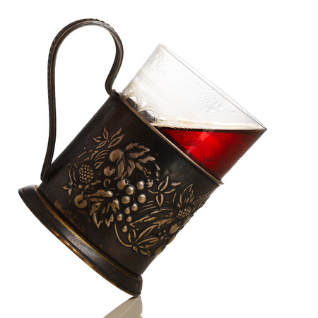 Glass of tea in vintage glass-holder (podstakannik)の写真素材