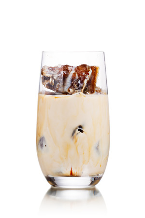 Milk coffee cocktail from frozen coffee cubes in highball glass. Iced milk coffeeの写真素材