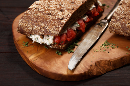 Sandwich with dark wholegrain rye bread and salmon. Healthy eatingの写真素材