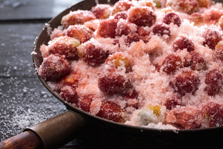 Strawberry Jam preparation. Berries mixed with sugar left for juice release
