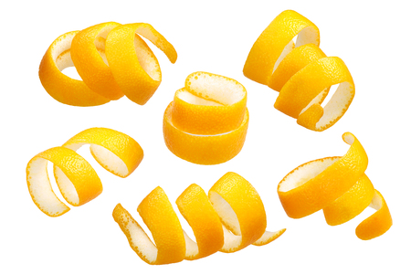 Twisted orange peel stripes or zest decoration isolated on whiteの写真素材
