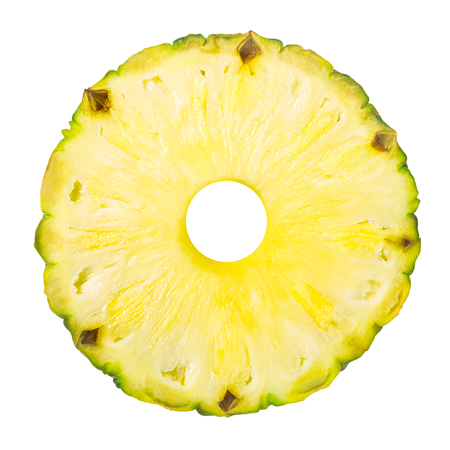 Pineapple (Ananas comosus) round slice, wheel or ring with rind, top viewの写真素材