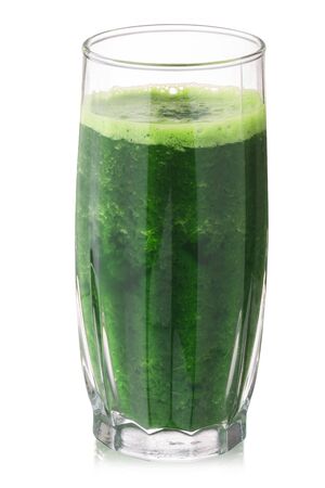 Wheatgrass juice in a faceted glass highball, isolatedの写真素材