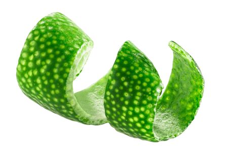 Lime twist, rolled up zest or curled peel, isolatedの写真素材