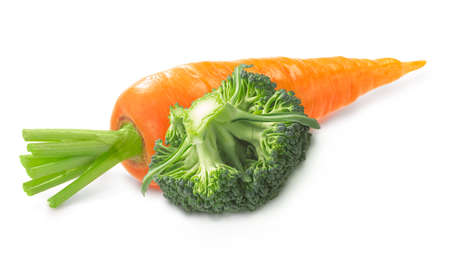 Broccoli head with fresh carrot isolatedの写真素材