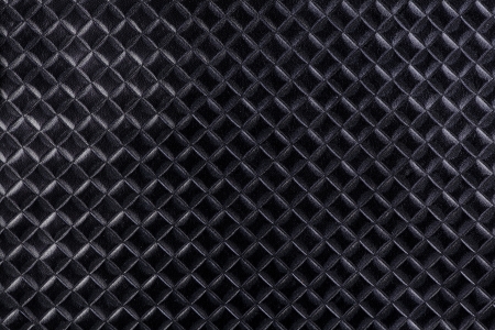 Texture of black leather with imprinted geometrical drawingの写真素材
