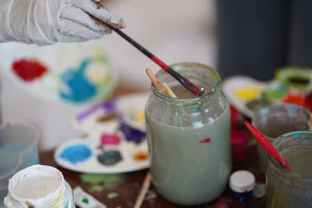 Painting tools: brushes, palette, paints. Essential for creativity.の写真素材