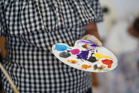 Painting tools: brushes, palette, paints. Essential for creativity.の写真素材