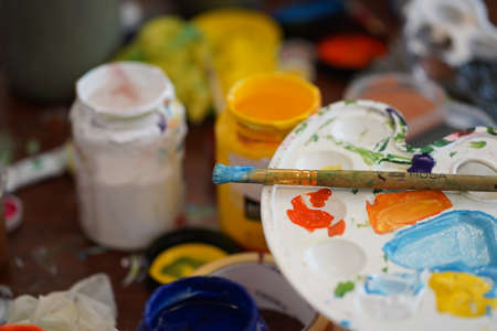 Painting tools: brushes, palette, paints. Essential for creativity.の写真素材