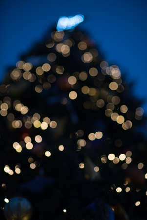 Dark bokeh as a background for celebrating cards or letters or postcardsの写真素材