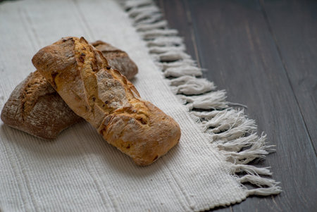 Baked bread on a sunlight with shadows