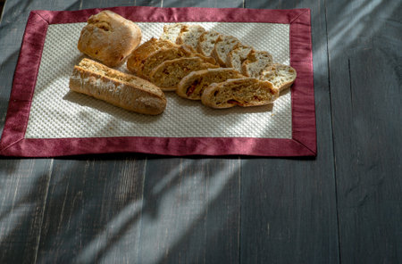 Baked bread on a sunlight with shadows