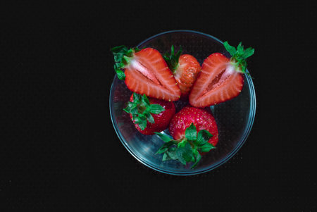 A Cup of coffee with some strawberry on different backgroundの写真素材
