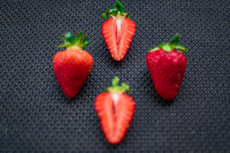 A Cup of coffee with some strawberry on different backgroundの写真素材