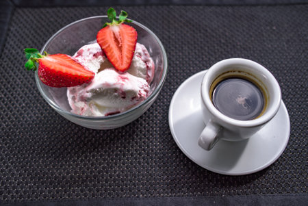 A Cup of coffee with some strawberry on different backgroundの写真素材