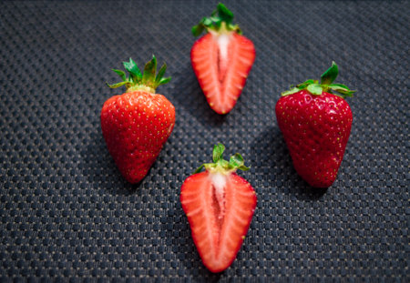 A Cup of coffee with some strawberry on different backgroundの写真素材