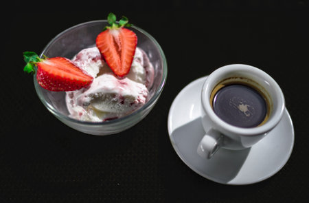A Cup of coffee with some strawberry on different backgroundの写真素材