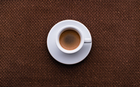 A Cup of coffee with some strawberry on different backgroundの写真素材