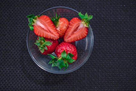 A Cup of coffee with some strawberry on different backgroundの写真素材