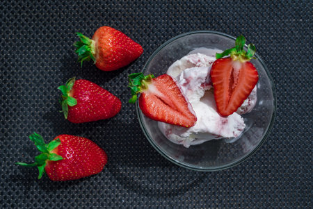 A Cup of coffee with some strawberry on different backgroundの写真素材