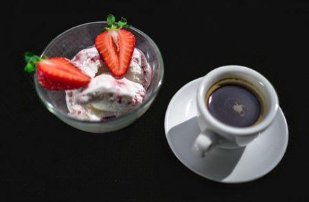 A Cup of coffee with some strawberry on different backgroundの写真素材