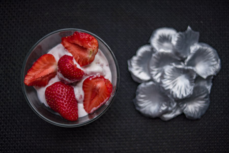 A Cup of coffee with some strawberry on different backgroundの写真素材