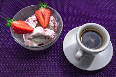 A Cup of coffee with some strawberry on different backgroundの写真素材