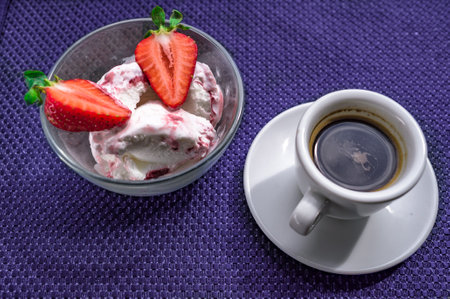 A Cup of coffee with some strawberry on different backgroundの写真素材