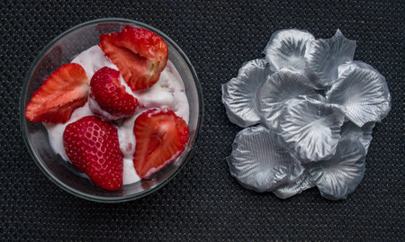 A Cup of coffee with some strawberry on different backgroundの写真素材