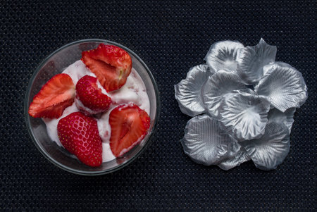 A Cup of coffee with some strawberry on different backgroundの写真素材