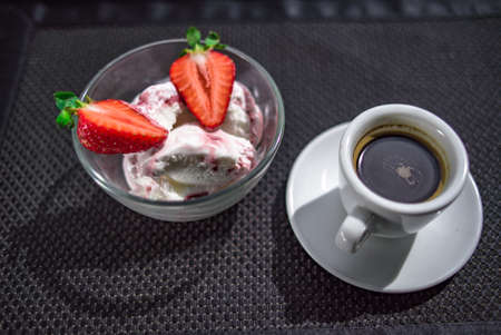 A Cup of coffee with some strawberry on different backgroundの写真素材