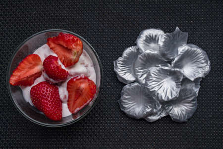 A Cup of coffee with some strawberry on different backgroundの写真素材