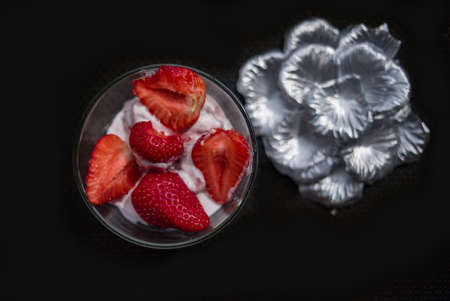 A Cup of coffee with some strawberry on different backgroundの写真素材