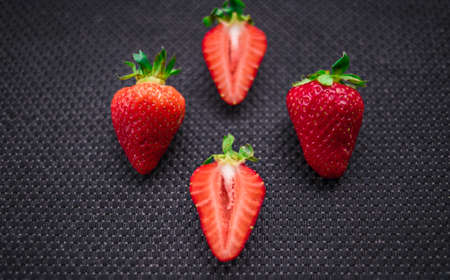 A Cup of coffee with some strawberry on different backgroundの写真素材