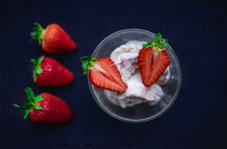 A Cup of coffee with some strawberry on different backgroundの写真素材