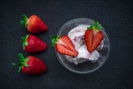 A Cup of coffee with some strawberry on different backgroundの写真素材