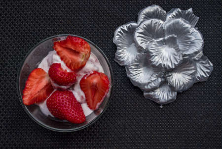 A Cup of coffee with some strawberry on different backgroundの写真素材