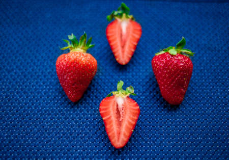 A Cup of coffee with some strawberry on different backgroundの写真素材