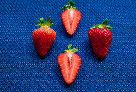 A Cup of coffee with some strawberry on different backgroundの写真素材