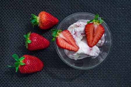 A Cup of coffee with some strawberry on different backgroundの写真素材