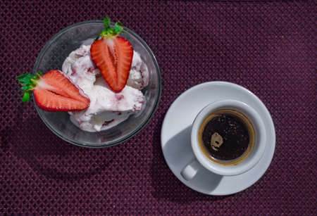 A Cup of coffee with some strawberry on different backgroundの写真素材