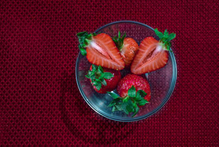 A Cup of coffee with some strawberry on different backgroundの写真素材