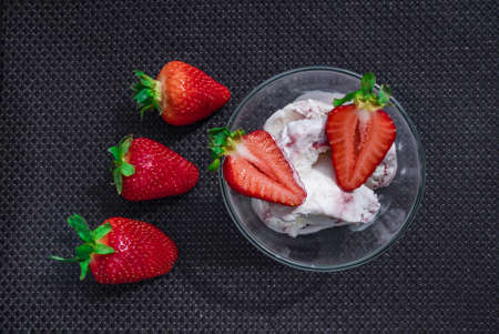 A Cup of coffee with some strawberry on different backgroundの写真素材