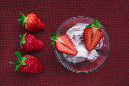 A Cup of coffee with some strawberry on different backgroundの写真素材