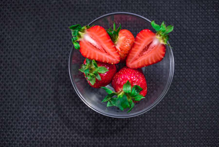 A Cup of coffee with some strawberry on different backgroundの写真素材