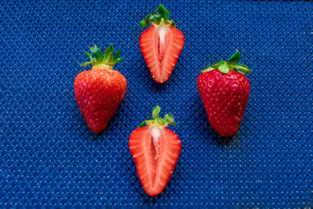 A Cup of coffee with some strawberry on different backgroundの写真素材