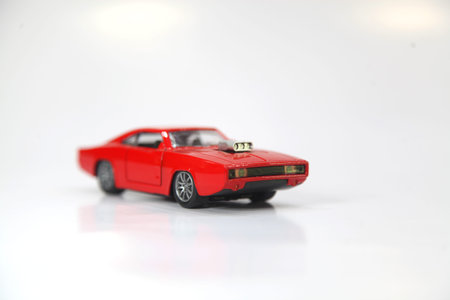 toy car on the road on a white bacground .