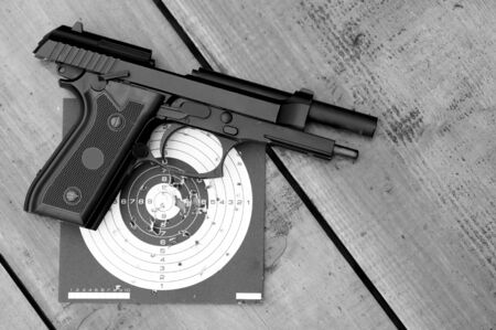 Unloaded air gun on targetの写真素材