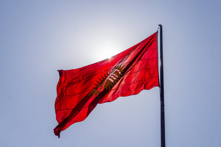 Flag of Kyrgyzstan Republic in the skyの写真素材
