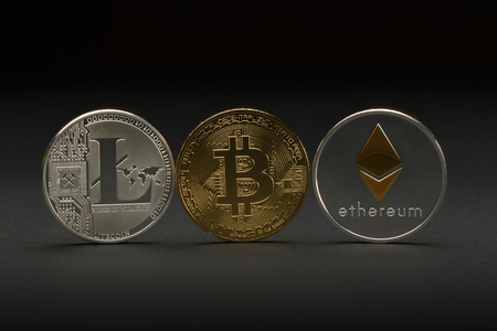 Bitcoin gold coin on black background. Bitcoin cryptocurrency.の写真素材